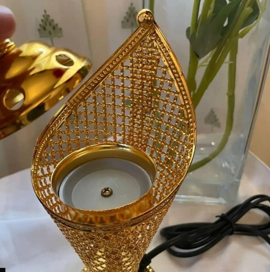 مبخرة كهربائية ذهبية بتصميم زخرفي ✨