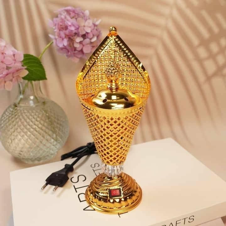 مبخرة كهربائية ذهبية بتصميم زخرفي ✨